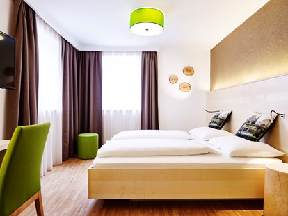 Nature hotel - Energieversorgung: 100 % Ökostrom - Doppelzimmer Superior Gartenhaus - Das Grüne Hotel zur Post - 100% BIO