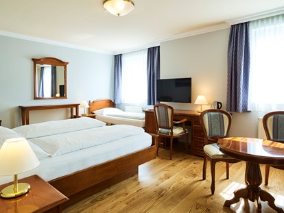 Naturhotel - Ferienwohnungen - Dreibettzimmer - Das Grüne Hotel zur Post - 100% BIO