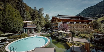 Naturhotel - Auszeichnung / Zertifikat / Partner: Bio Austria - Österreich - Pools in Schwimmteich im Garten - Gartenhotel Theresia****S