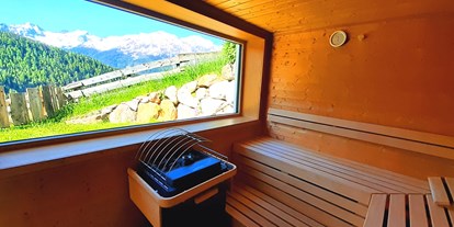 Naturhotel - Ökoheizung: Holzheizung: ja, Scheitholz - Tiroler Oberland - Sauna mit Panoramablick - Bio & Reiterhof der Veitenhof