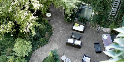 Naturhotel - Green Meetings werden angeboten - Wien-Stadt - Garten mit Loungebereich - Boutiquehotel Stadthalle