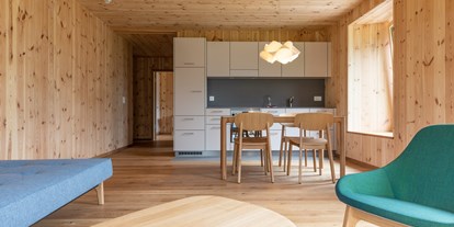 Nature hotel - Switzerland - Ferienwohnungen im Holz100-Stil - ChieneHuus