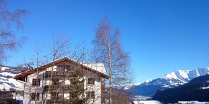 Naturhotel - auch für Familien mit Kindern - Schweiz - Winterlandschaft des Biohotels - Biohotel Ucliva