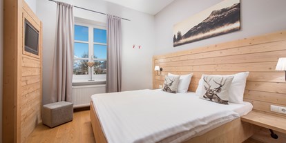 Naturhotel - Bio-Küche: Glutenfreie Kost möglich - Hinterglemm - Doppelzimmer der S-Kategorie mit kleinem Schlafbereich - Q! Resort Health & Spa Kitzbühel