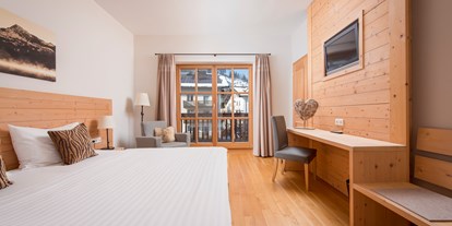 Naturhotel - Wassersparmaßnahmen - Leogang - Doppelzimmer der M-Kategorie im historischen Stammhaus - Q! Resort Health & Spa Kitzbühel