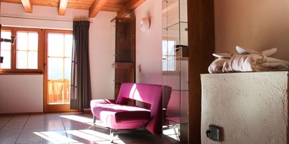 Naturhotel - Umgebungsschwerpunkt: Berg - Osttirol - Gästezimmer Morgensonne mit Lehmputzwänden - Veganer Gasthof zum Ederplan
