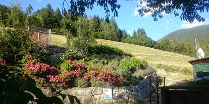 Naturhotel - Bio-Hotel Merkmale: Naturgarten - Iselsberg - In den Bergen in pollenarmer Luft auf 1130m gelegen - Veganer Gasthof zum Ederplan