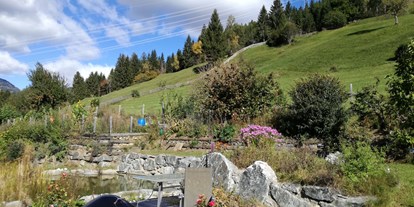 Naturhotel - Bio-Küche: Laktosefreie Kost möglich - Tirol - Naturgarten mit Teich - Veganer Gasthof zum Ederplan