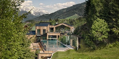 Naturhotel - Bio-Hotel Merkmale: Naturgarten - Kitzbühel - Das Naturhotel in den Alpen auf 3800 qm waldSPA. - Naturhotel Forsthofgut
