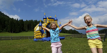 Naturhotel - Umgebungsschwerpunkt: See - Österreich - Spielparadies für Kinder mit Hüpfburg - BIO-Kinderhotel Kreuzwirt