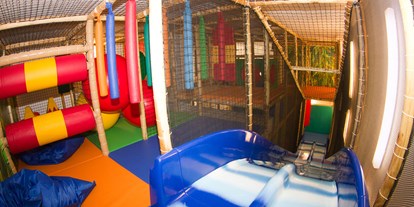 Naturhotel - Fitnessraum - Soft-Play-Anlage mit Rutsche - BIO-Kinderhotel Kreuzwirt