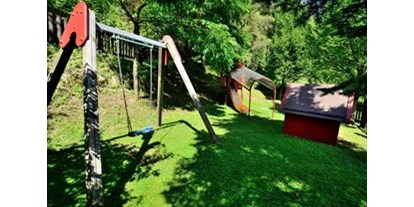 Naturhotel - Bio-Küche: Bio-vegan möglich - Kitzbühel - Spielplatz im Garten - The RESI Apartments "mit Mehrwert"