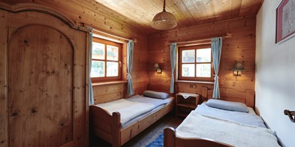 Naturhotel - Zertifizierte Naturkosmetik - Rohrmoos - Schlafzimmer Sonnenwohnung im Waldhaus - Naturhaus Lehnwieser