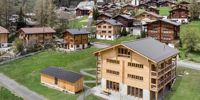 Nature hotel - Wasserbehandlung/ Energetisierung: Verwirbeltes Wasser - Aussenansicht Berglodge Goms - Berglodge Goms