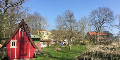 Naturhotel - Seminare & Schulungen - Ostfriesland - Mit großem Garten und Zeltwiese  - Yoga Vidya Nordsee