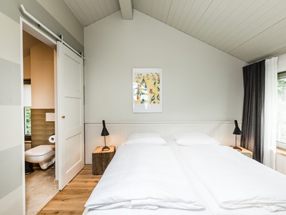 Naturhotel - Umgebungsschwerpunkt: Meer - Ostseeküste - Schlafzimmer im Obergeschoss - im-jaich Naturoase Gustow