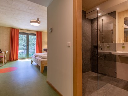 Nature hotel - Ökoheizung: Holzheizung: ja, Scheitholz - Hotel 11 Eulen / Uhlenköper-Camp Uelzen
