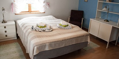 Naturhotel - Umgebungsschwerpunkt: Land - Vimmerby - Doppelbett. - Lilla Sverigebyn