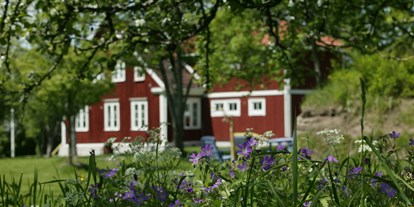 Naturhotel - Müllmanagement: Müllstationen für Gäste - Vimmerby - Ein veganes, ökologisches Urlaubsparadies im Süden von Schweden. - Lilla Sverigebyn