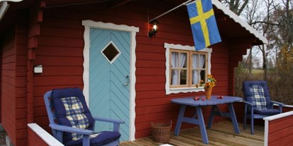 Naturhotel - Bio-Küche: Vollwertküche - Südschweden - Neben Ferienhütten kann man hier auch Camping machen. - Lilla Sverigebyn