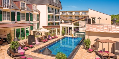 Naturhotel - Pool - Rheinland-Pfalz - Wellnesshotel Zum Kurfürsten mit Außenpool - LIFESTYLE Resort Zum Kurfürsten