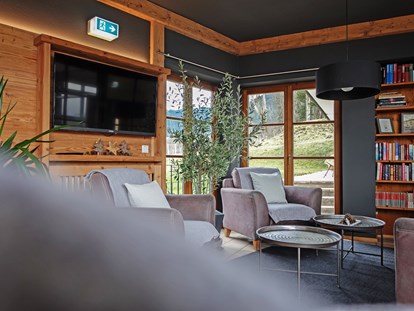 Naturhotel - Sauna - Obsteig - Unser neuer Wintergarten – der ideale Platz für gemütliche Stunden mit einem guten Buch und einer Tasse frischen Bio-Kaffee.  - moor&mehr Bio-Kurhotel