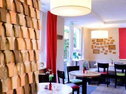 Nature hotel - Ökoheizung: Holzheizung: ja, Pellet - Die Wirtschaft - traditionell innovativ - krenzers rhön: Hotel + Apfelweingut + Bio-Landwirtschaft