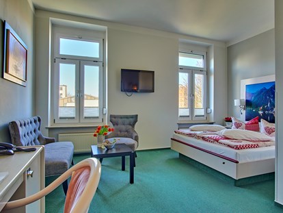 Nature hotel - Germany - BIO HOTEL Amadeus: Komfortzimmer Hallstatt Bahnseite - Biohotel Amadeus