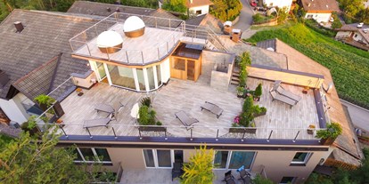 Naturhotel - Green Meetings werden angeboten - Dachterrasse mit Sauna und Ruhezonen - Bio & Bikehotel Steineggerhof