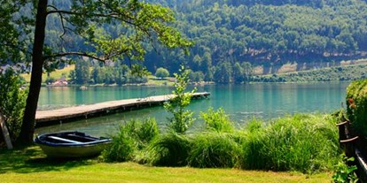 Naturhotel - Sonnenterrasse - Kärnten - Privatstrand, Badestrand mit Liegewiese an einem der wärmsten Badeseen Europas, dem Klopeiner See - Loving Hut am Klopeiner See