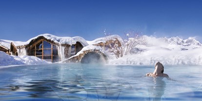 Naturhotel - auch für Familien mit Kindern - Going am Wilden Kaiser - Beheizter Pool der Wasserwelten im Winter - Biohotel Stanglwirt