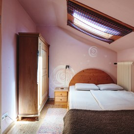 Biohotel: Schlafzimmer im kleinsten Apartment - Naturhaus Lehnwieser
